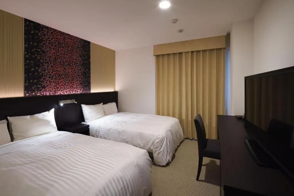 Bed in JR-EAST HOTEL METS NAGAOKA