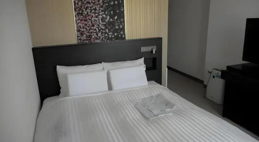 Bed in JR-EAST HOTEL METS NAGAOKA Bed in JR-EAST HOTEL METS NAGAOKA