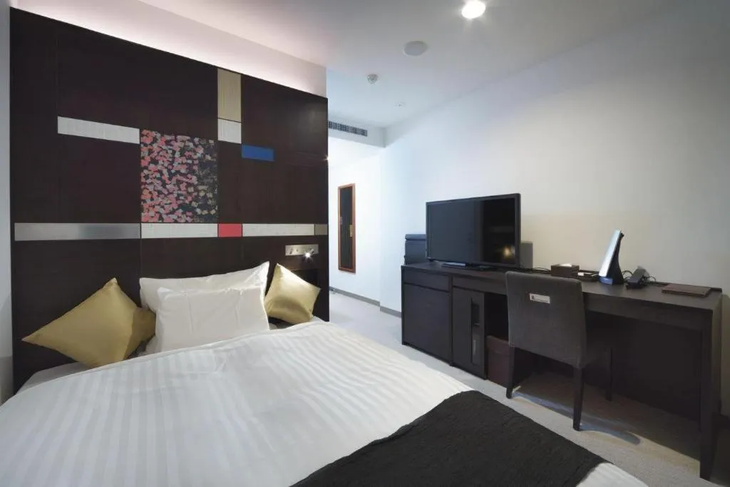 Bed in JR-EAST HOTEL METS NAGAOKA