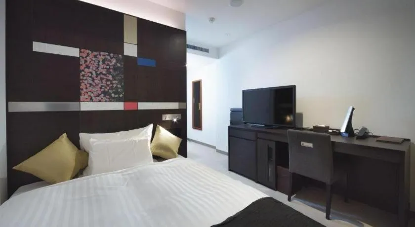 Bed in JR-EAST HOTEL METS NAGAOKA