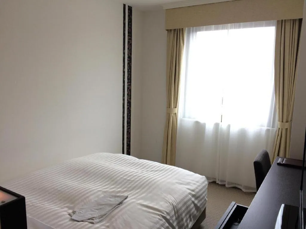 Bed in JR-EAST HOTEL METS NAGAOKA