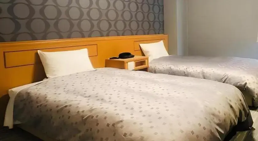 Bed in Urban Place Inn Kokura Bed in Urban Place Inn Kokura