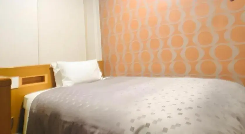 Bed in Urban Place Inn Kokura Bed in Urban Place Inn Kokura