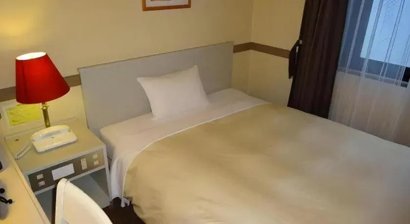 Bed in Matsumoto Wellton Hotel Bed in Matsumoto Wellton Hotel