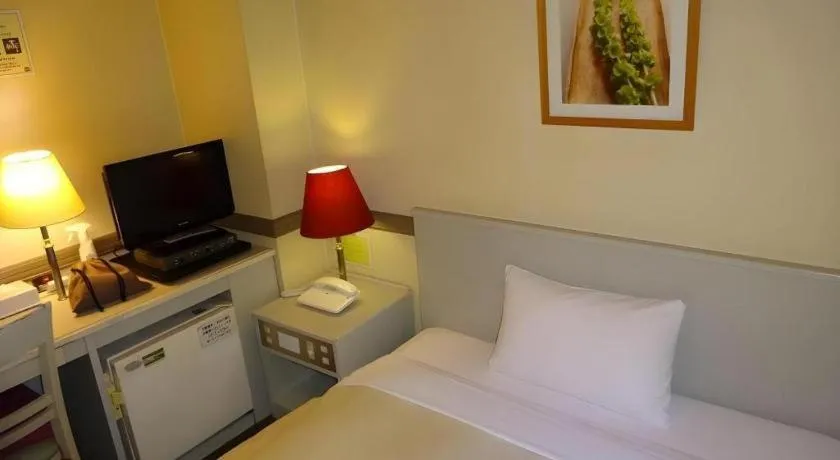 Bed in Matsumoto Wellton Hotel