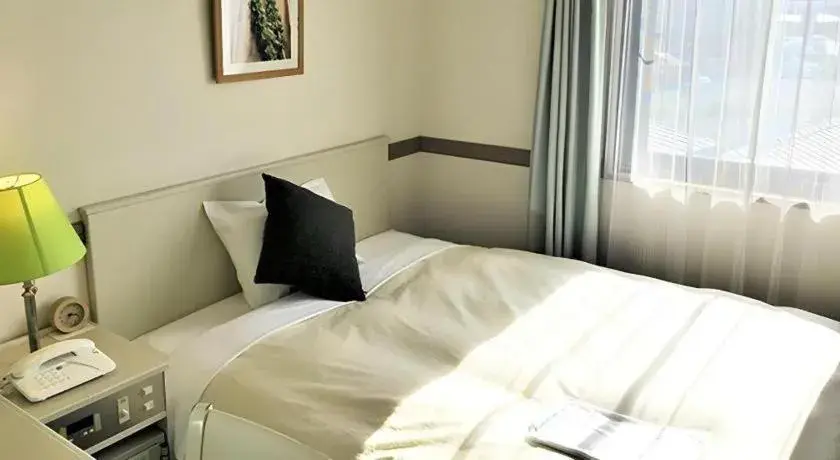 Bed in Matsumoto Wellton Hotel Bed in Matsumoto Wellton Hotel