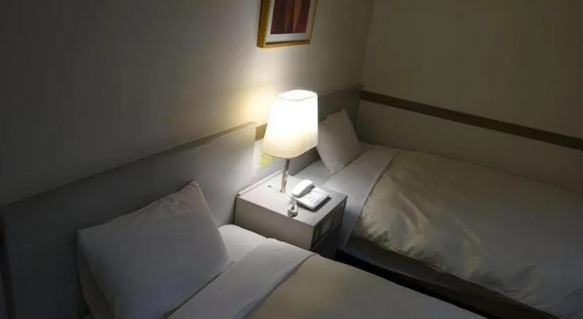 Bed in Matsumoto Wellton Hotel