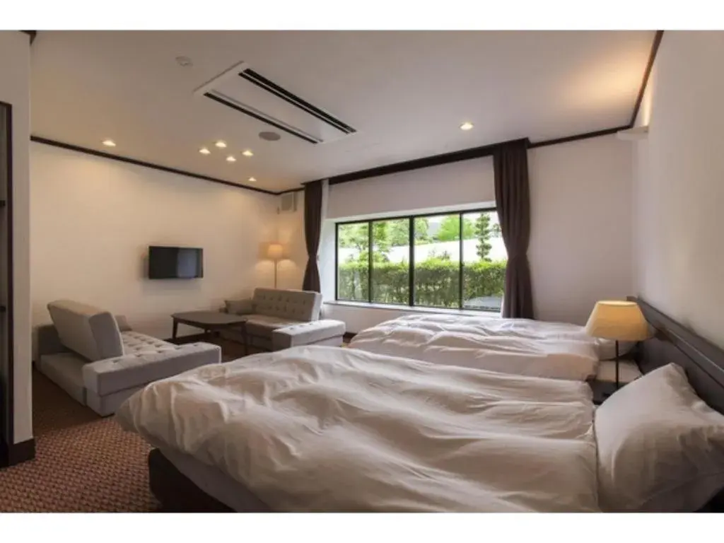 Bed in Hotel Silk Onsen Yamabiko Bed in Hotel Silk Onsen Yamabiko