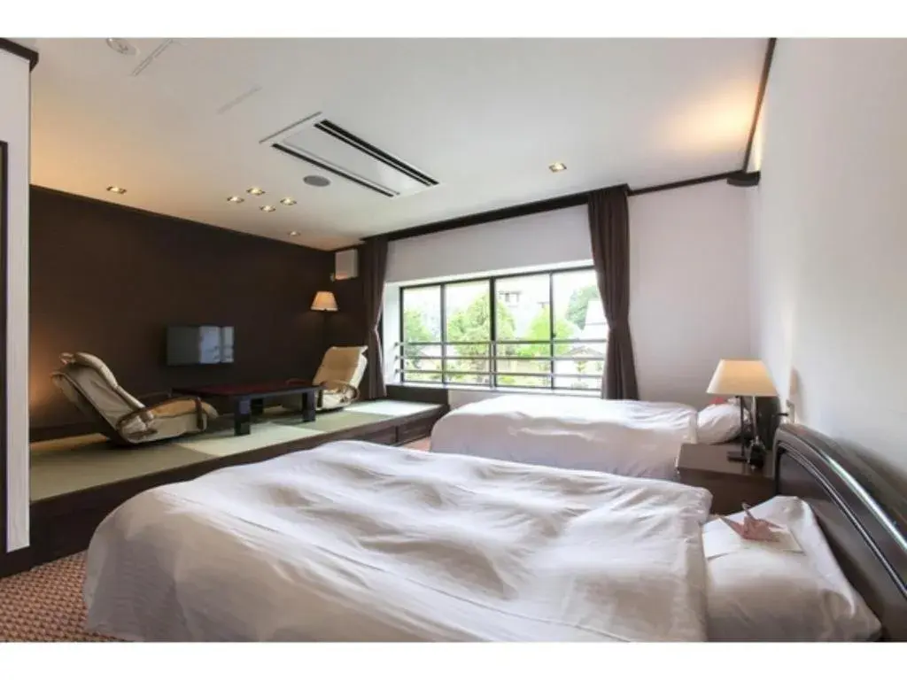 Bed in Hotel Silk Onsen Yamabiko Bed in Hotel Silk Onsen Yamabiko