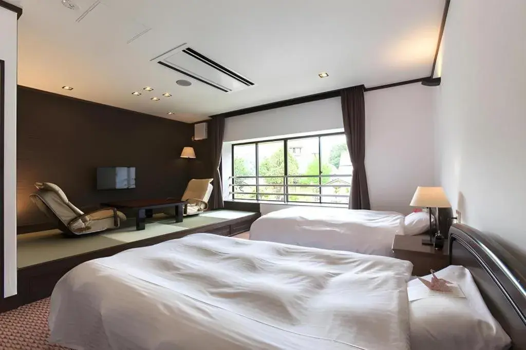 Bed in Hotel Silk Onsen Yamabiko Bed in Hotel Silk Onsen Yamabiko