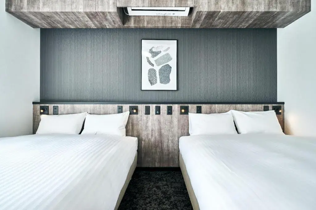 Bed in Grand STAY Hakata Station North Bed in Grand STAY Hakata Station North