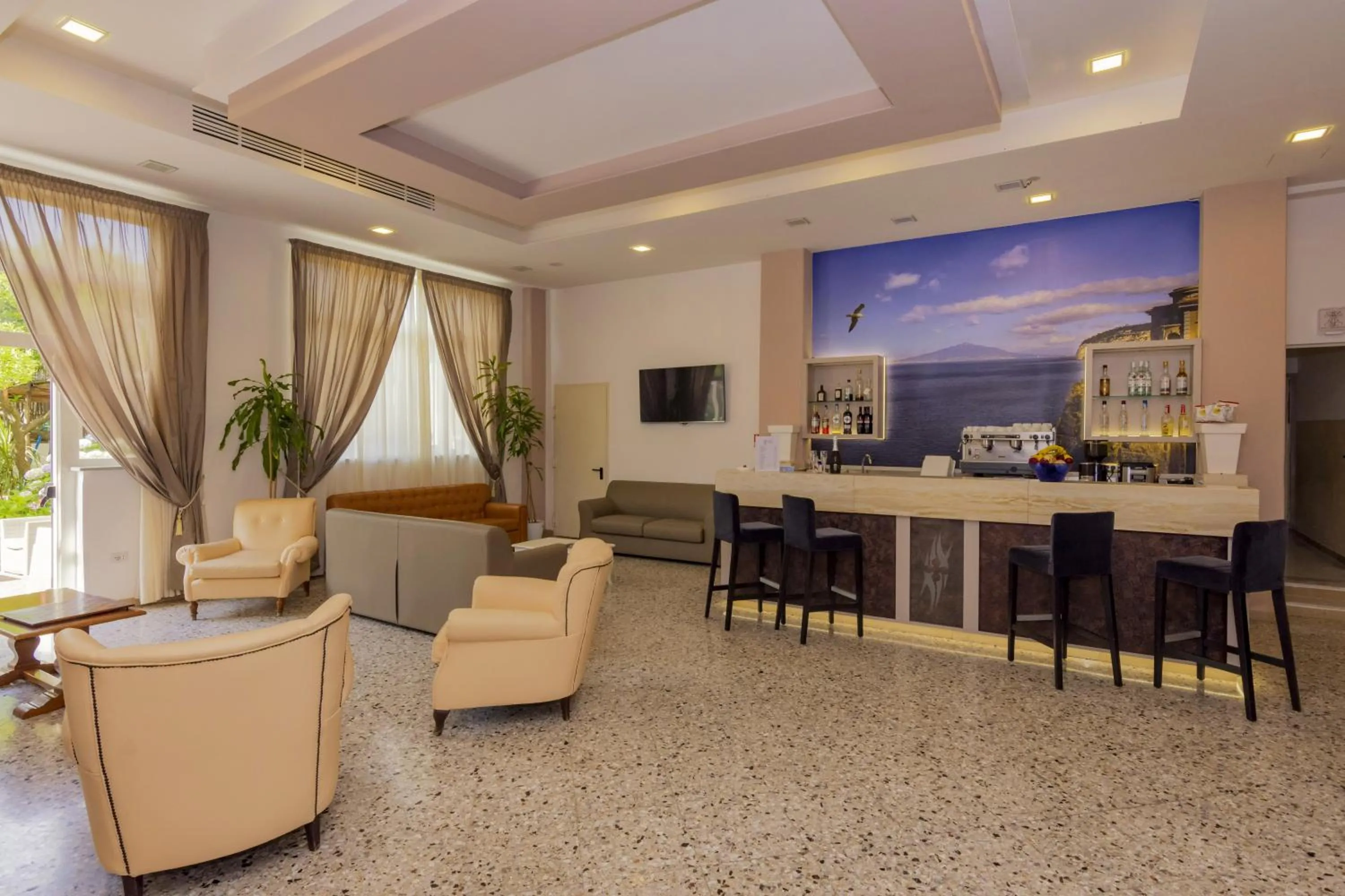 Communal lounge/ TV room in Sisters Hotel