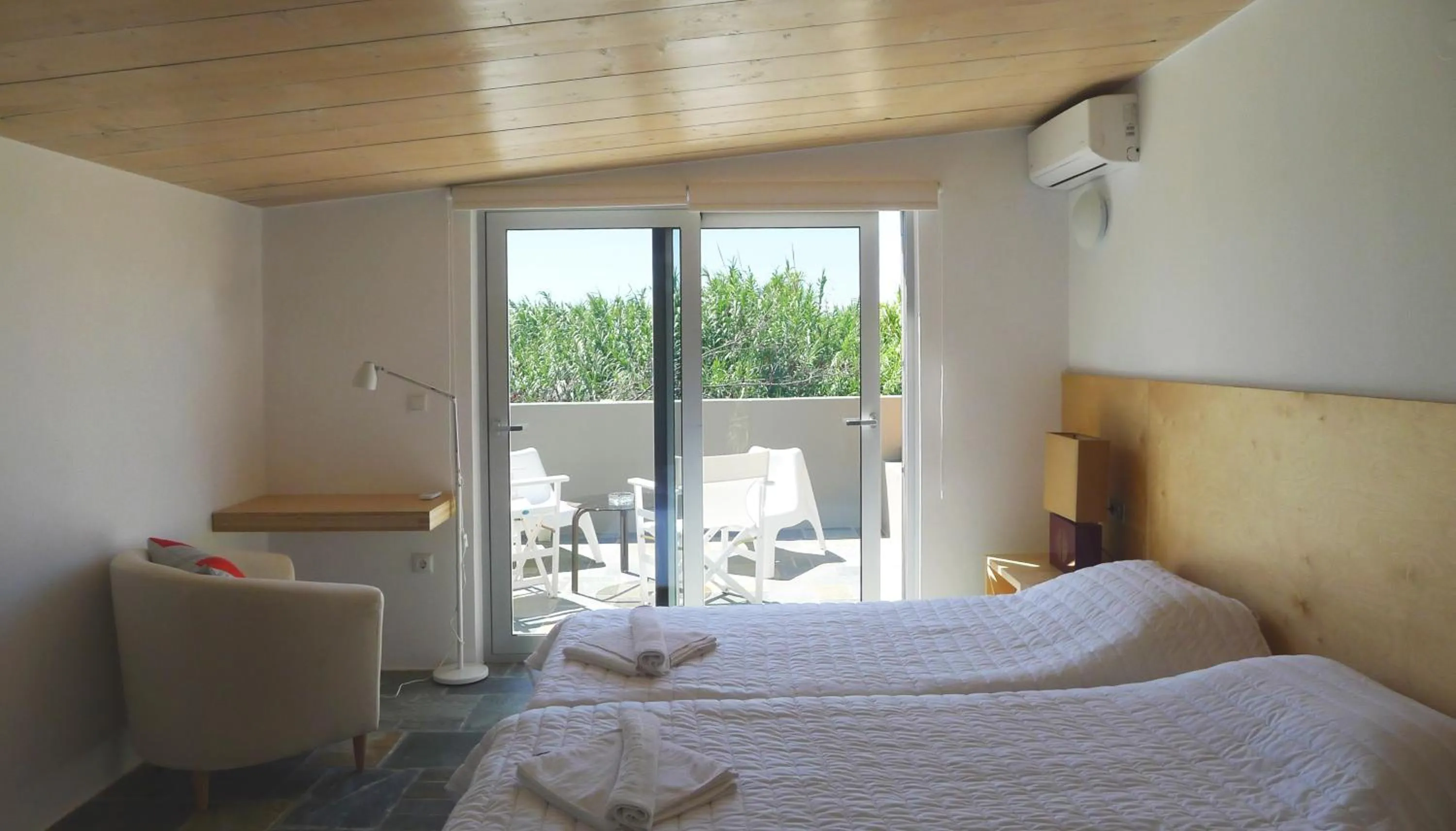 Bed in Proimos Apartments