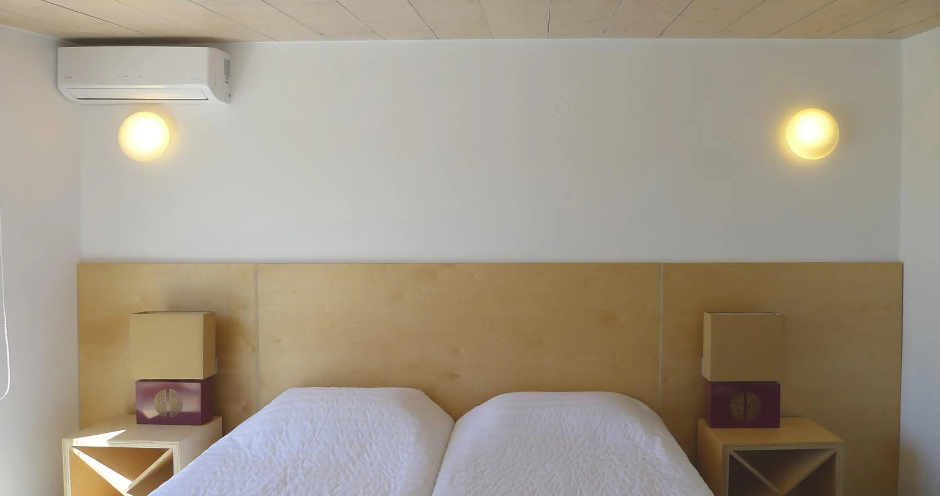 Bed in Proimos Apartments