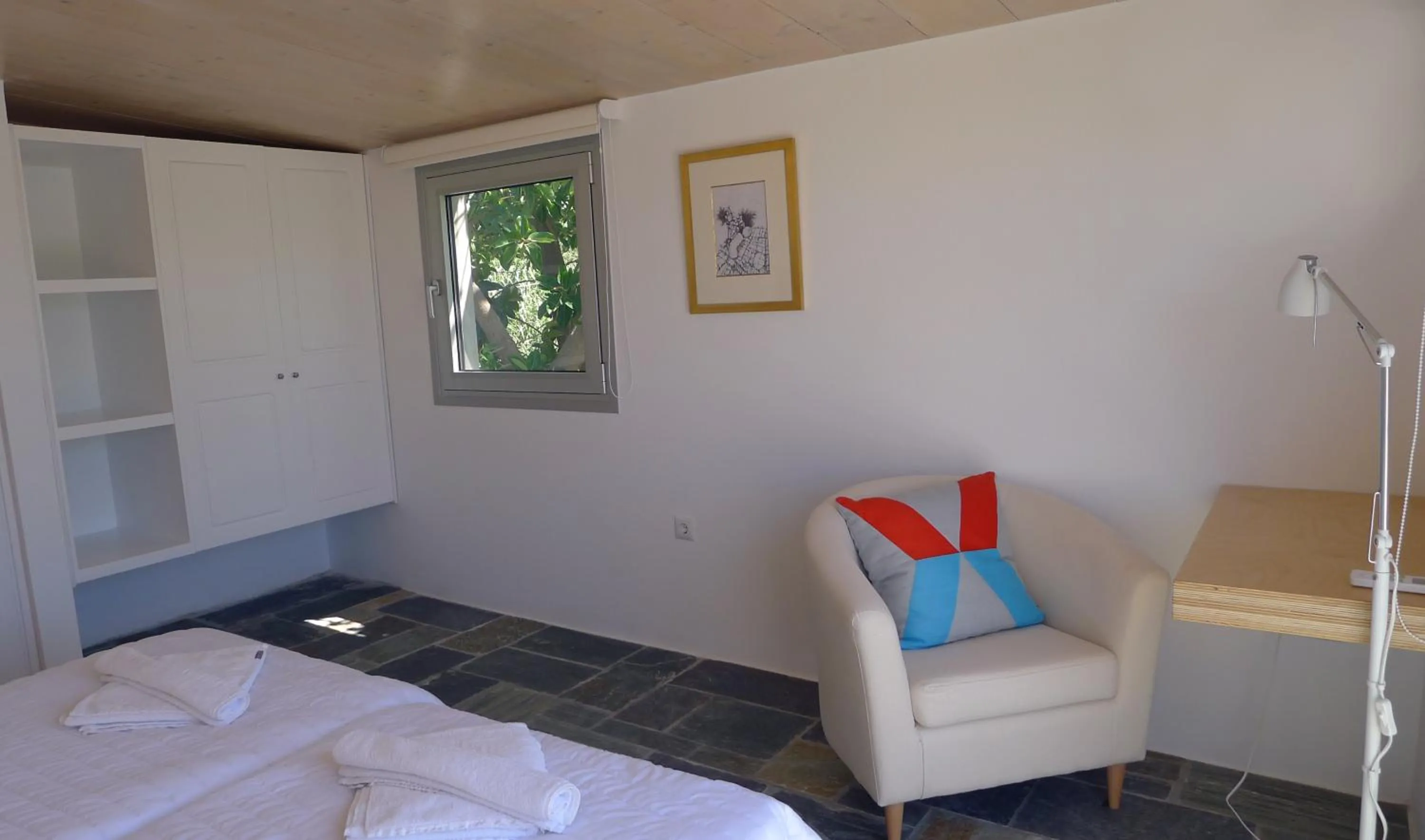 Bed in Proimos Apartments