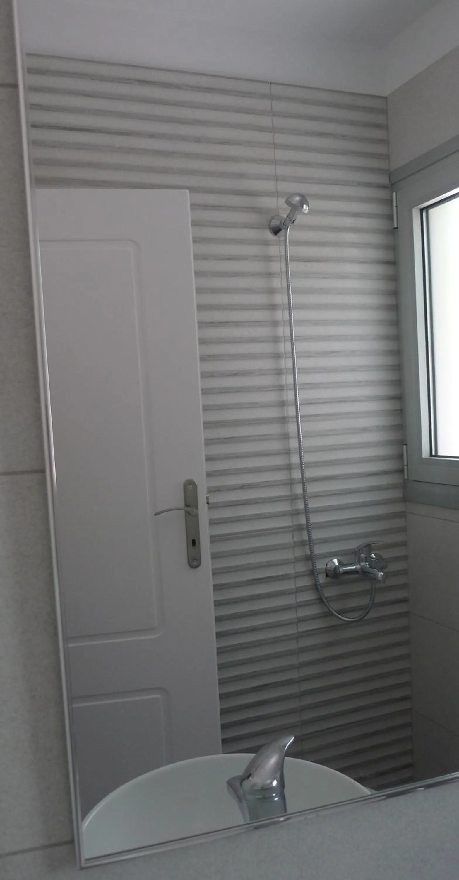 Bathroom in Proimos Apartments