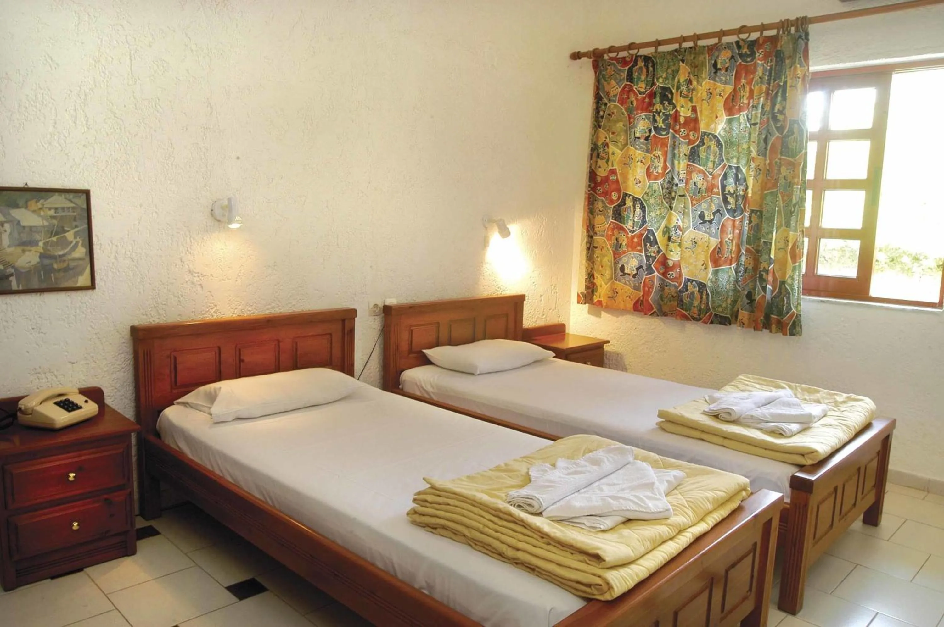 Bed in Proimos Apartments