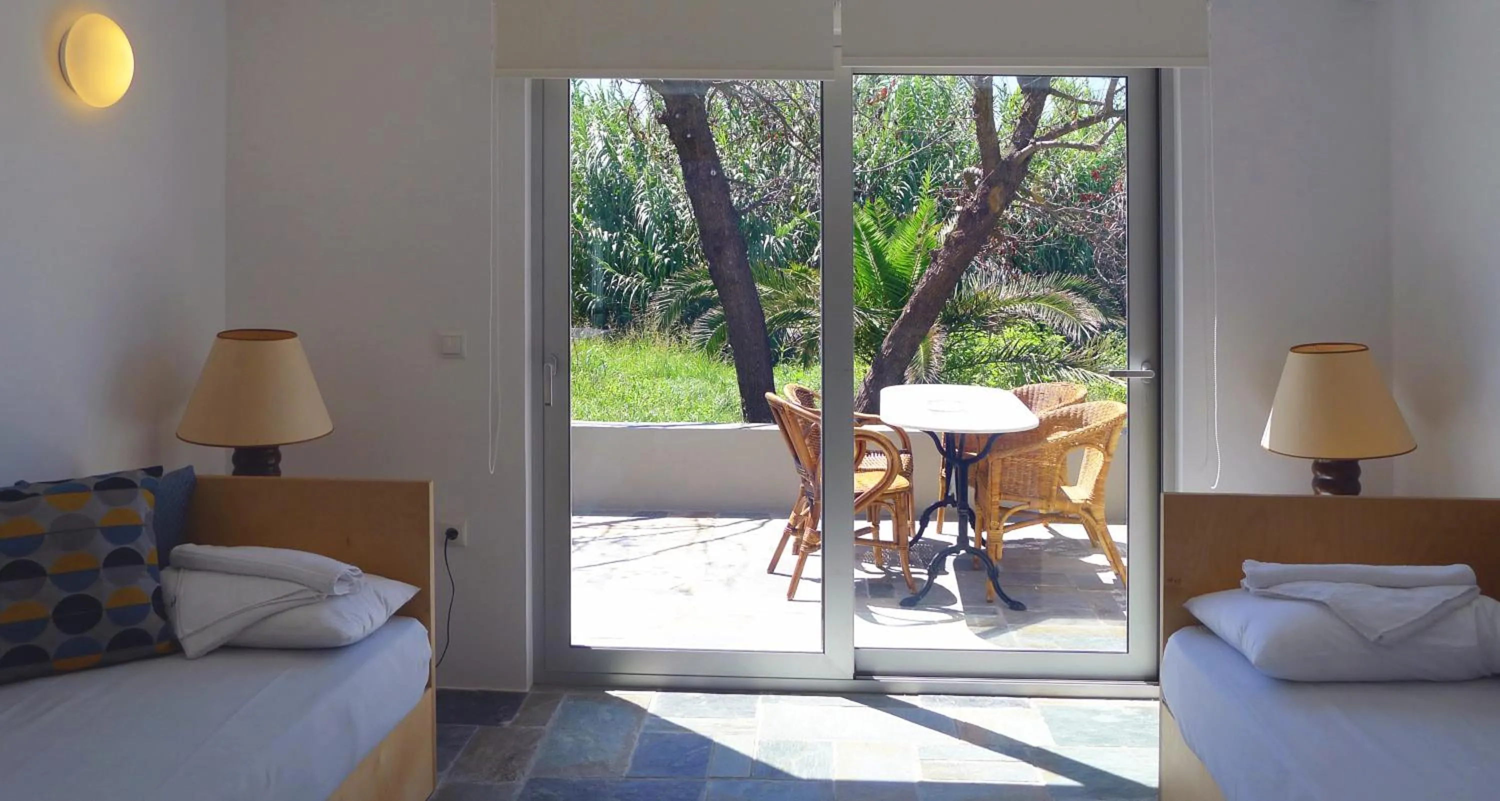 Bed in Proimos Apartments