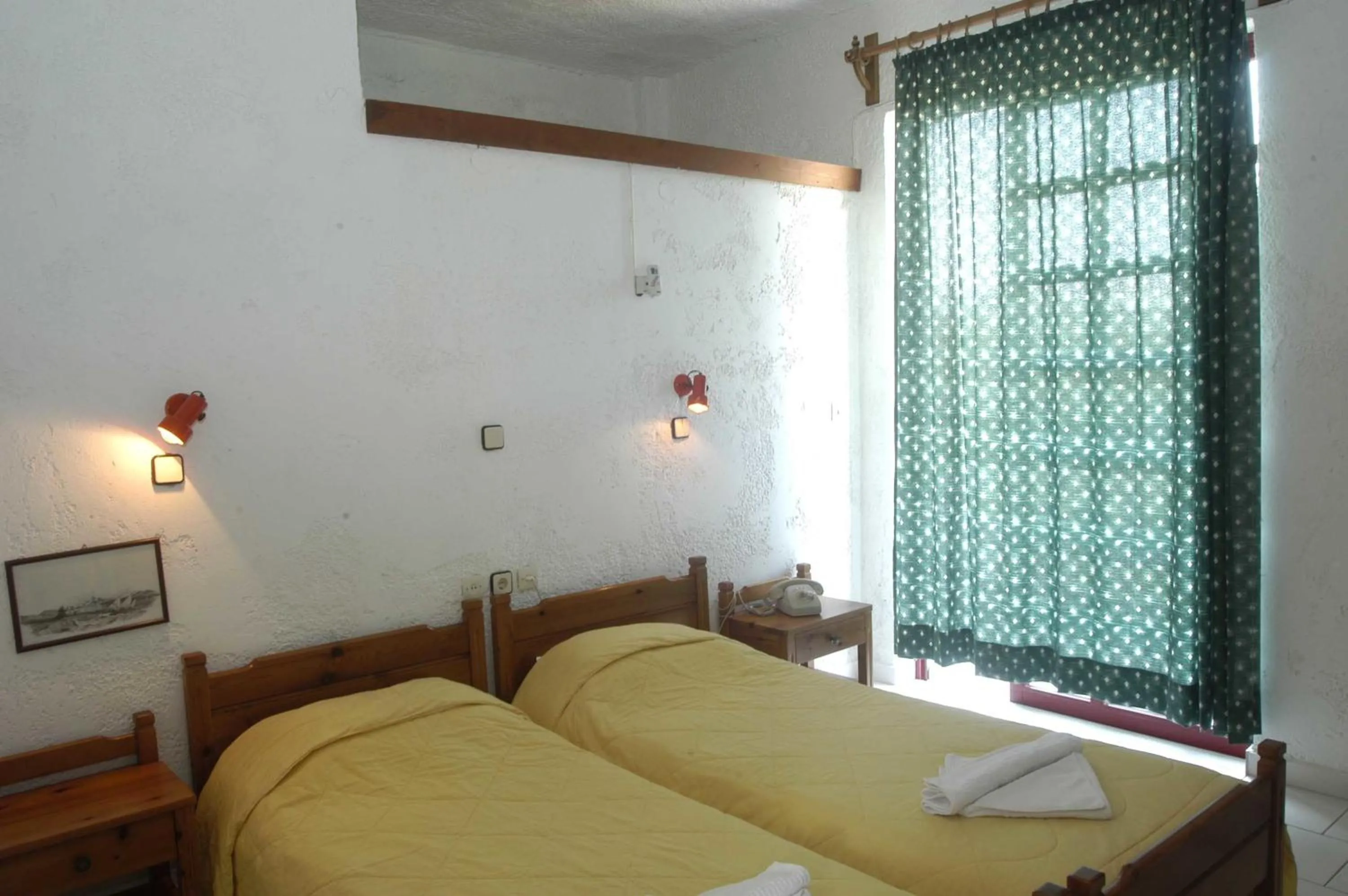 Bed in Proimos Apartments