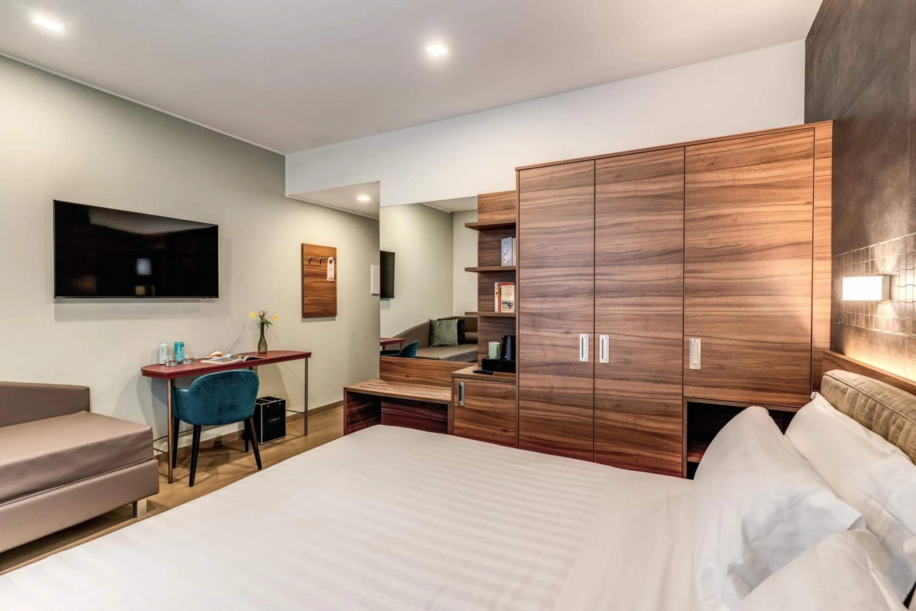 Photo of the whole room, Bed in Adoro Hotel