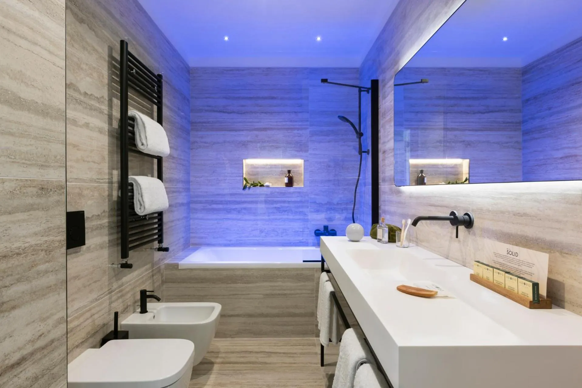 Shower, Bed in Adoro Hotel