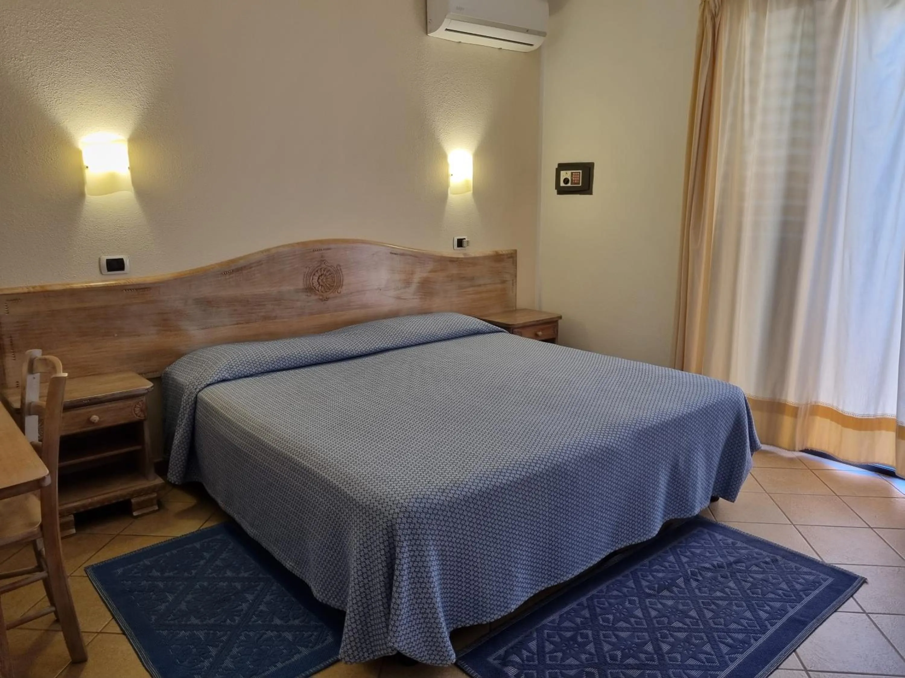 Bed in Hotel Delle Isole
