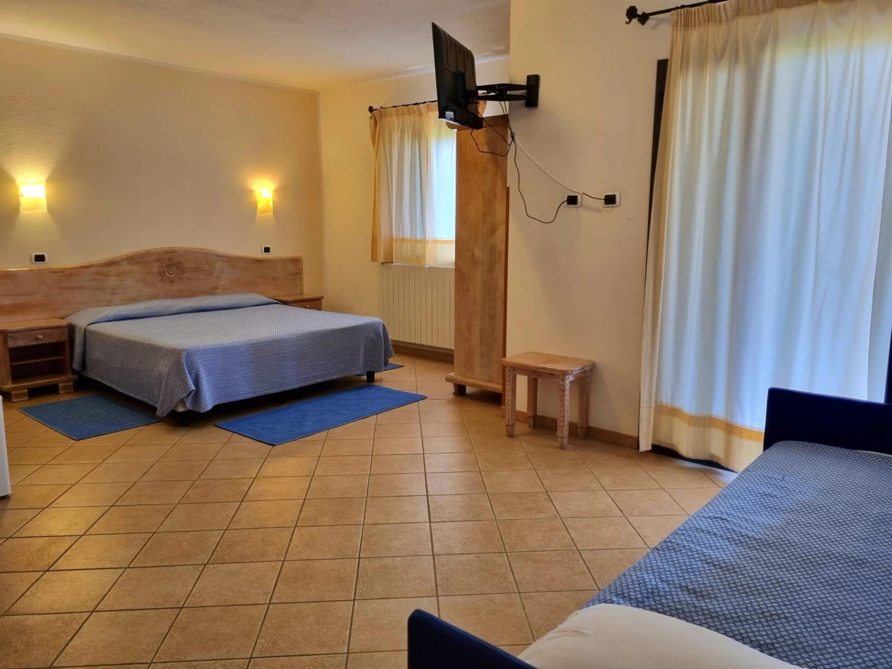 Bed in Hotel Delle Isole