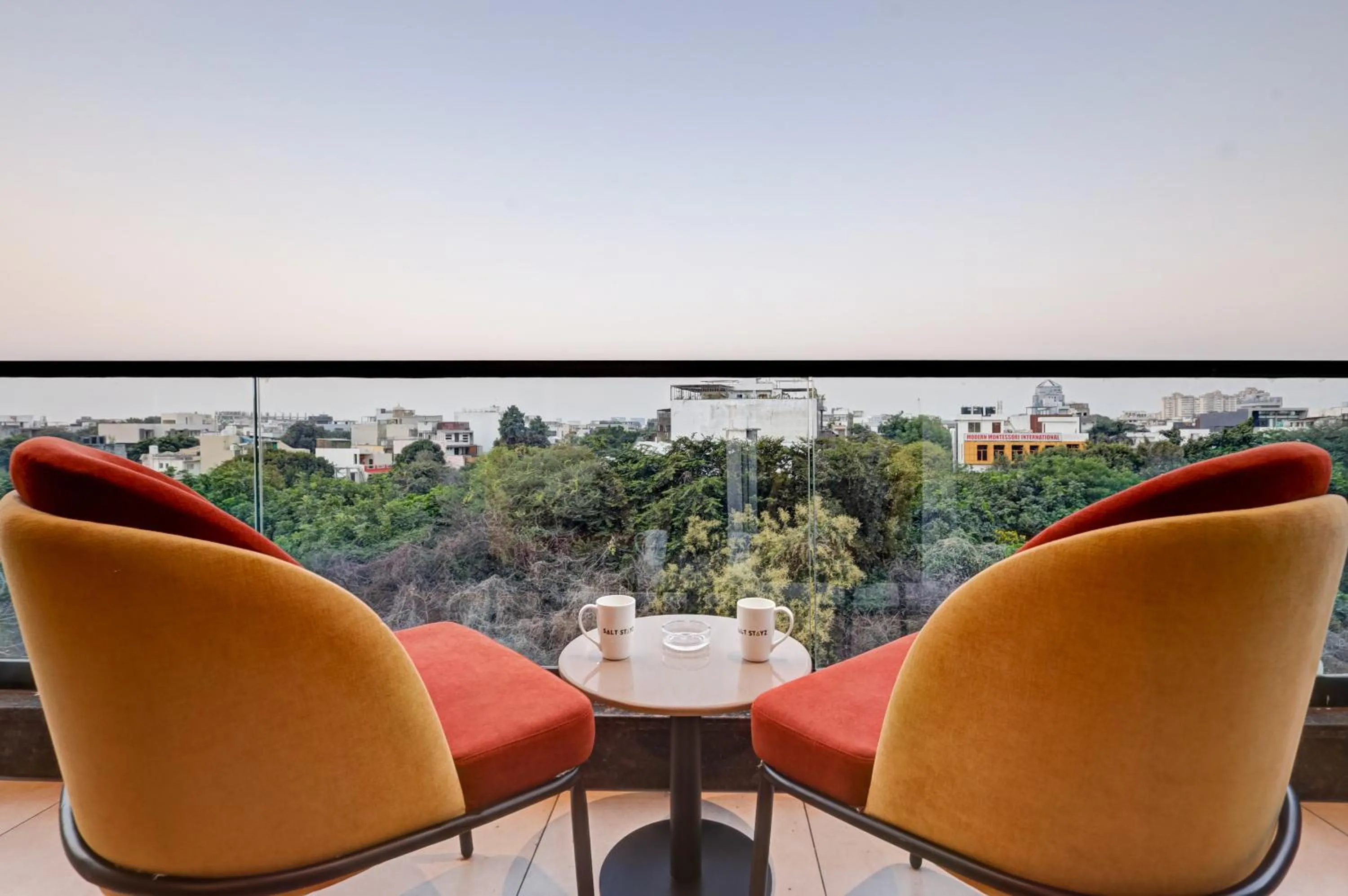 Twin Suite With city view Balcony in Saltstayz Premier - Golf Course Road & Sector 42
