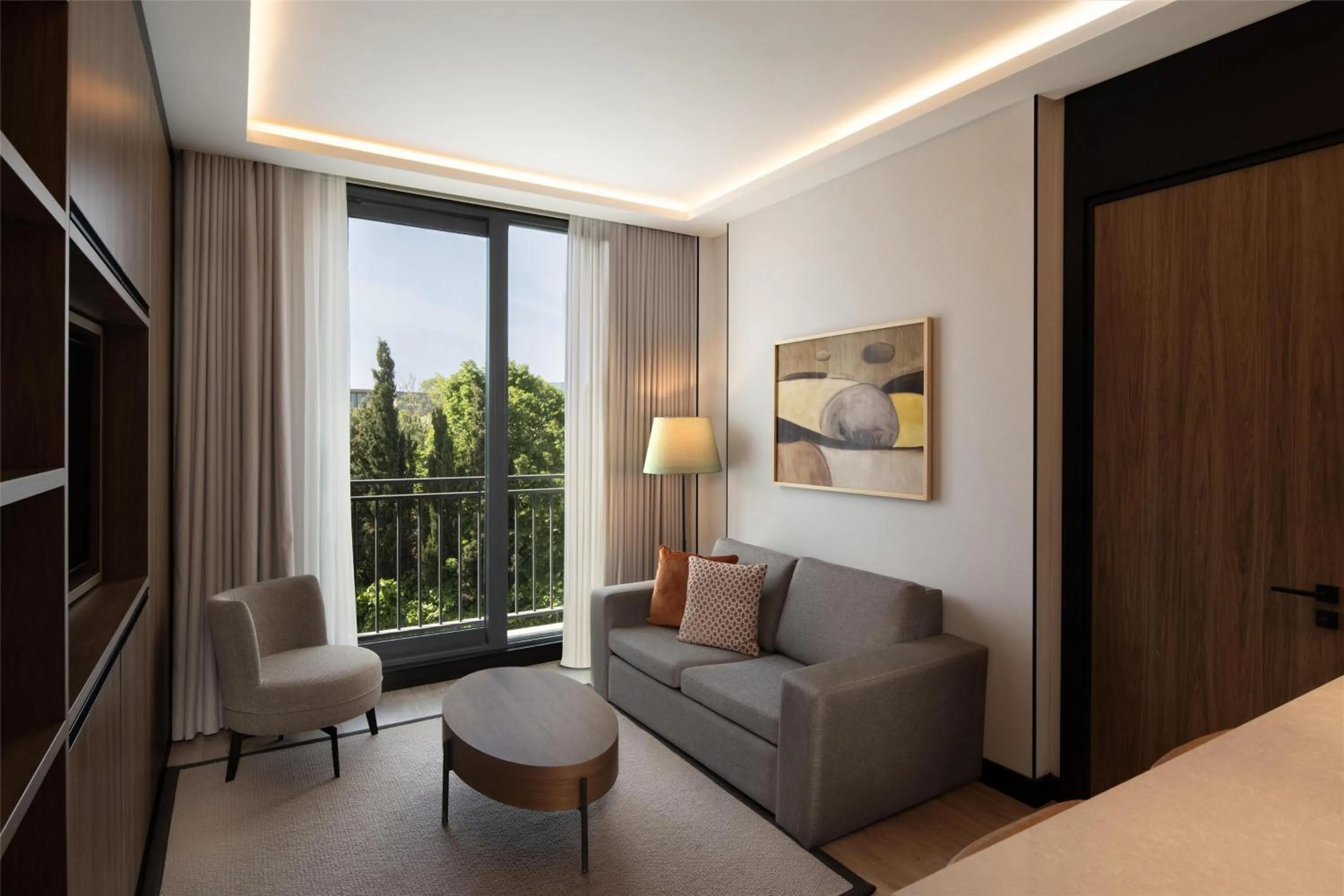 Living room, Bed in Altunizade Suites Istanbul, Curio Collection By Hilton