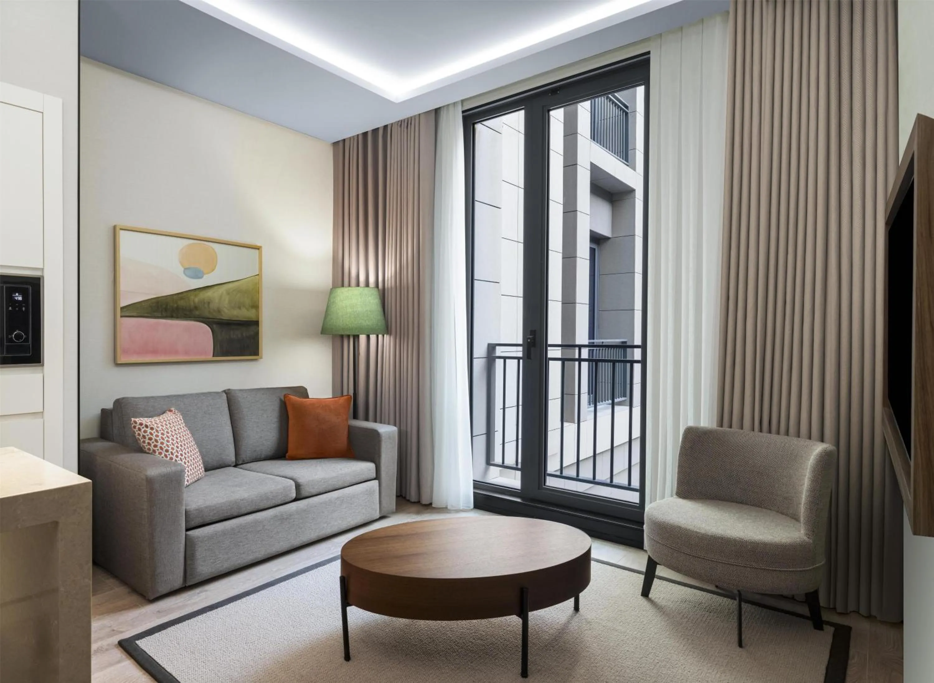 Living room in Altunizade Suites Istanbul, Curio Collection By Hilton