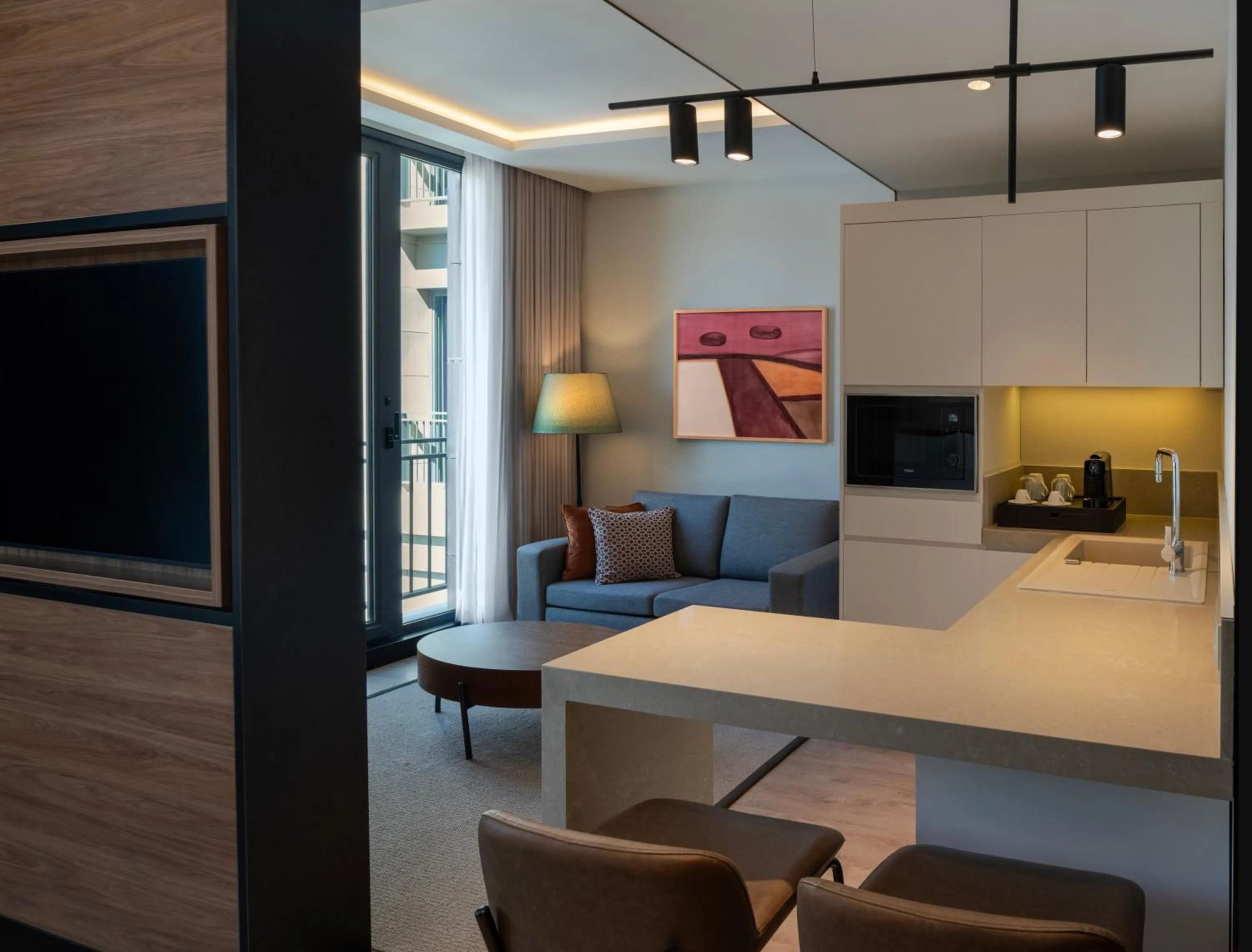 Living room, Bed in Altunizade Suites Istanbul, Curio Collection By Hilton