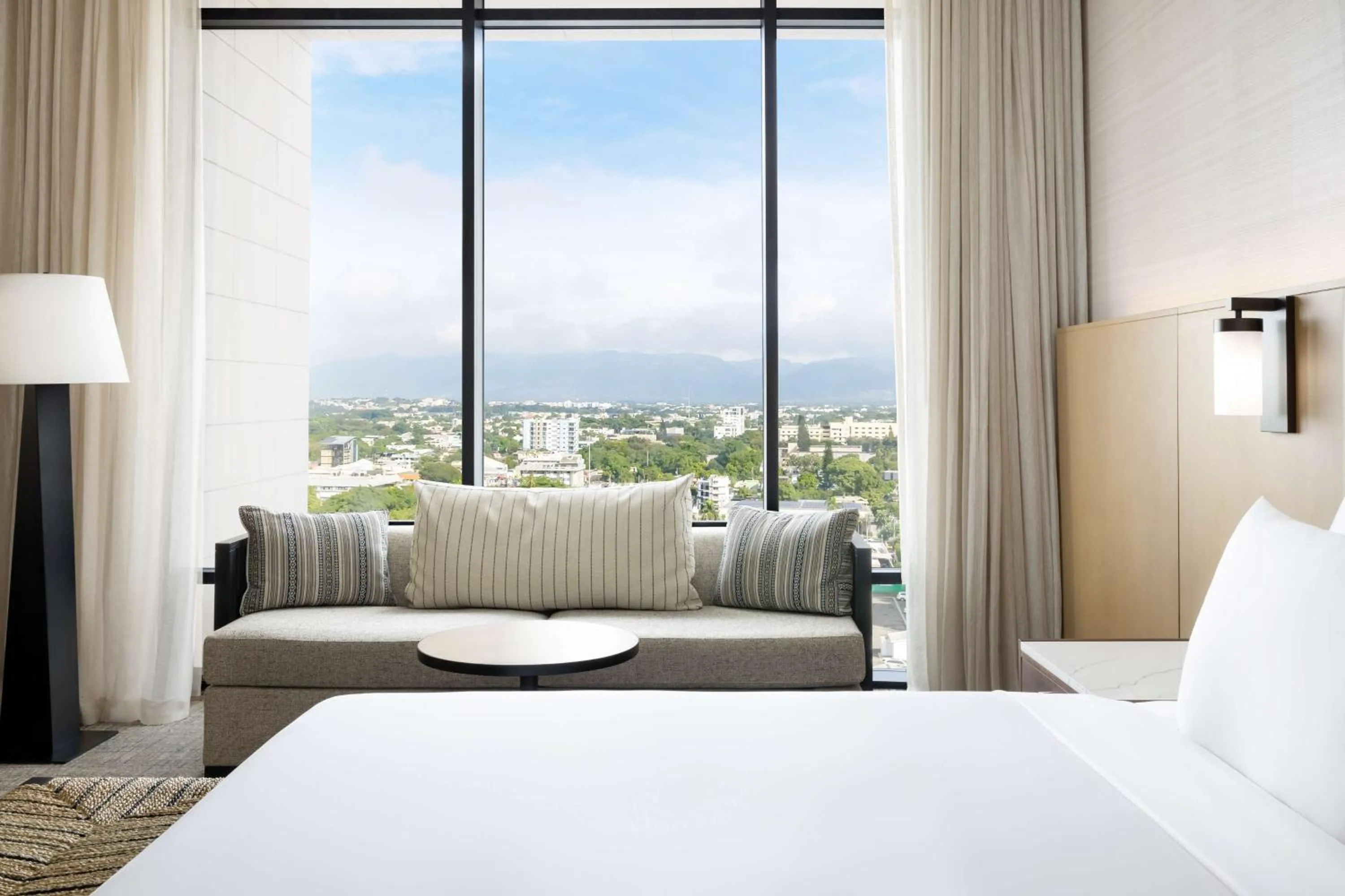 Living room, Bed in Hotel Santiago, Curio Collection By Hilton