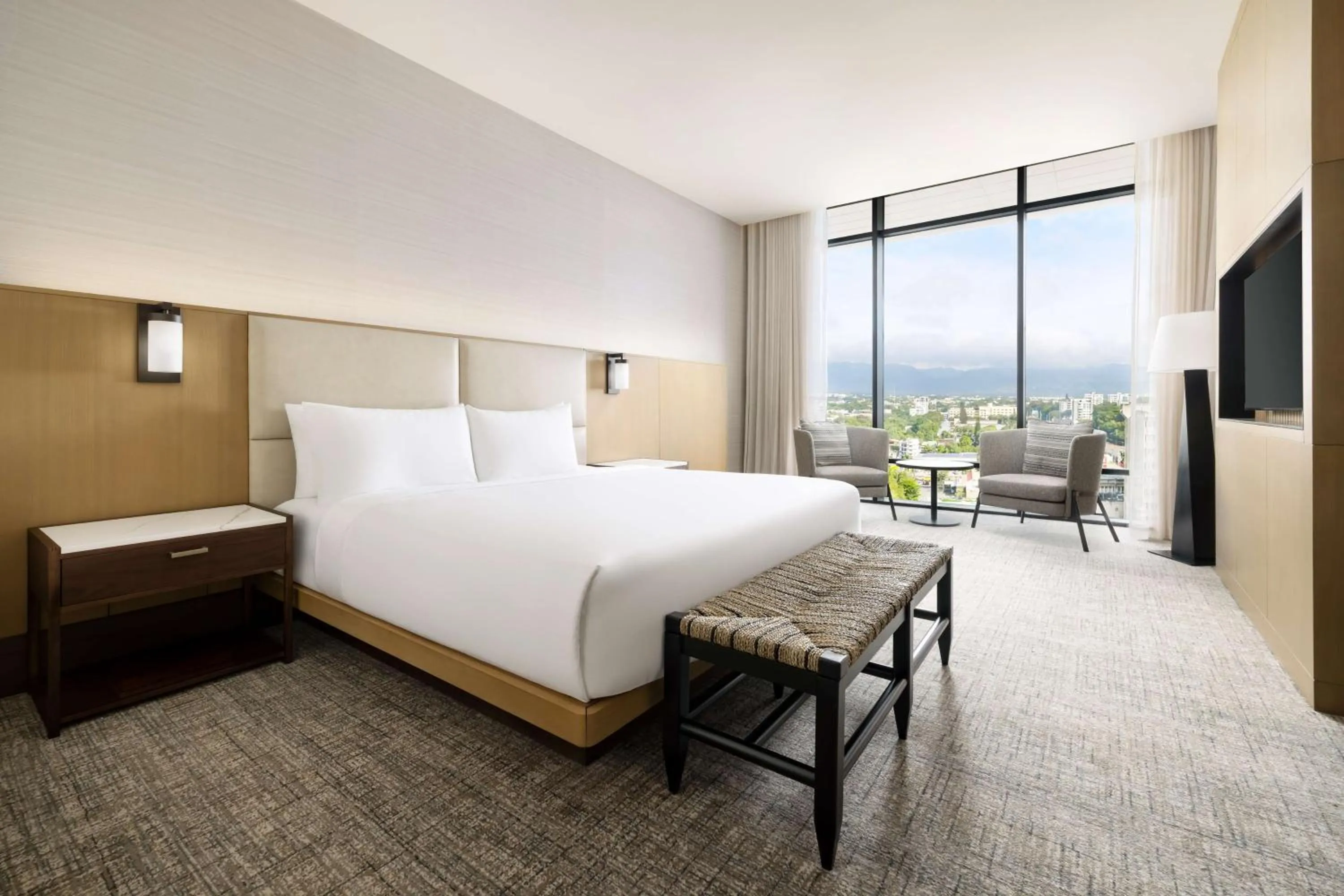 Living room, Bed in Hotel Santiago, Curio Collection By Hilton