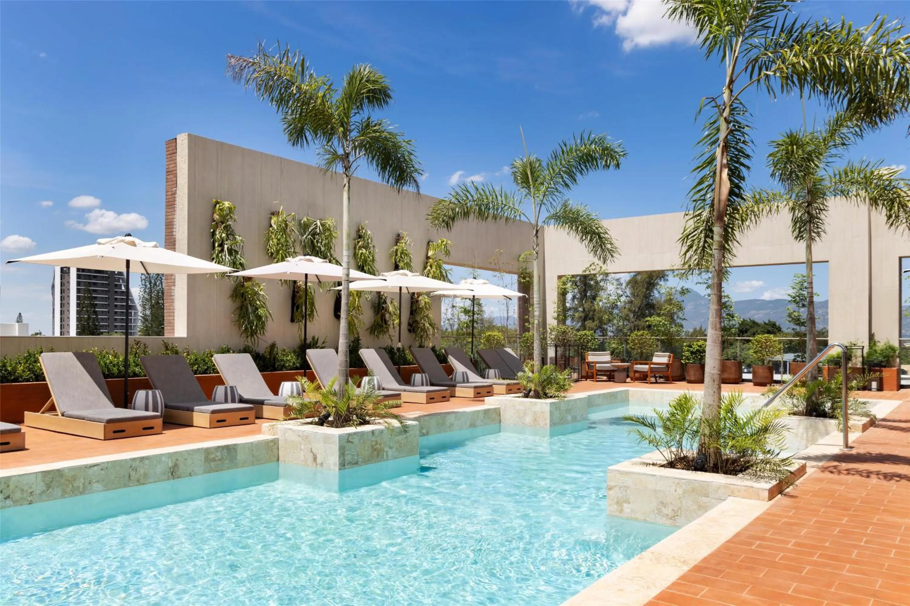 Pool view in Hotel Santiago, Curio Collection By Hilton