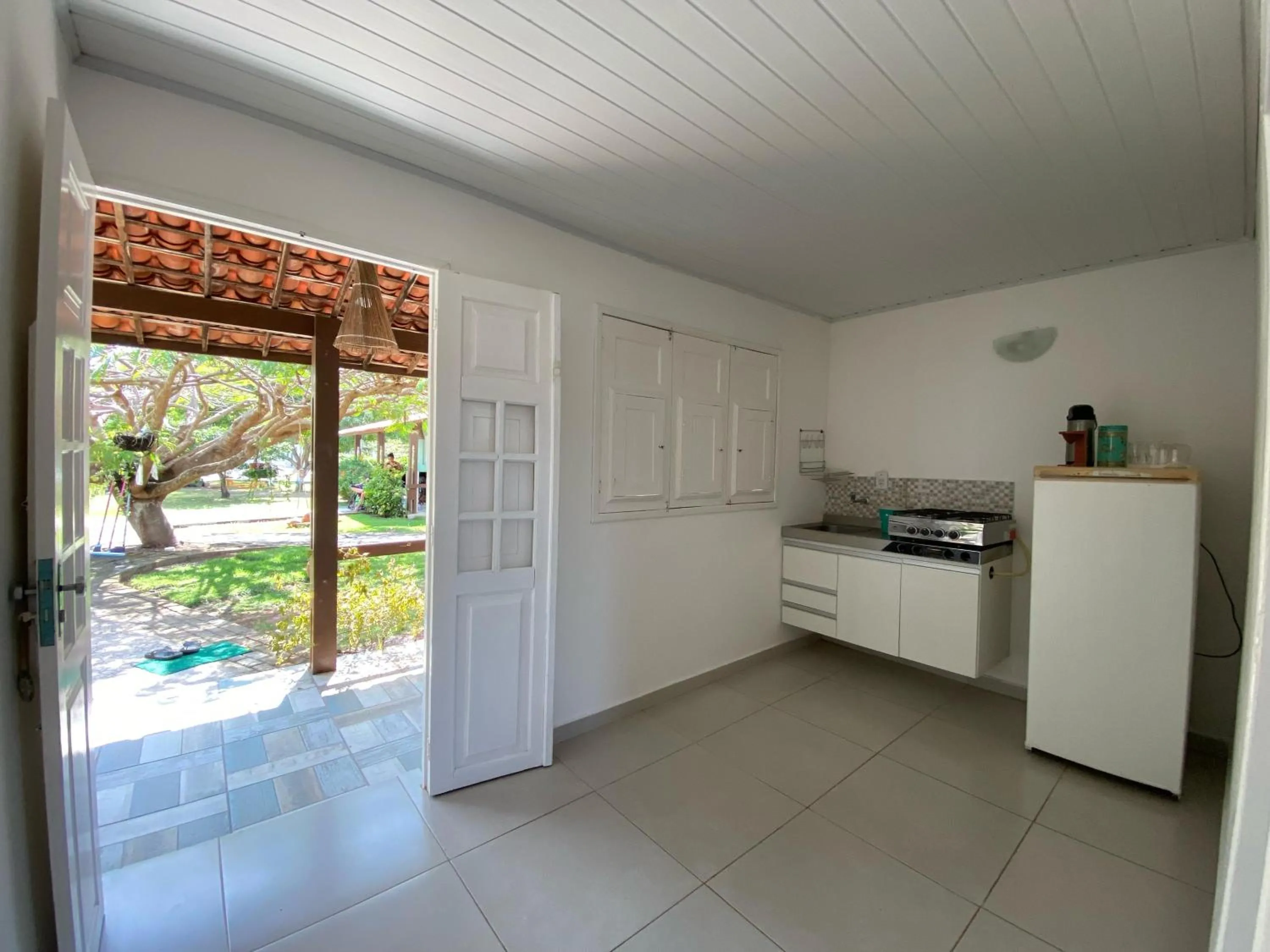 Kitchen or kitchenette in Pousada Kaluanã