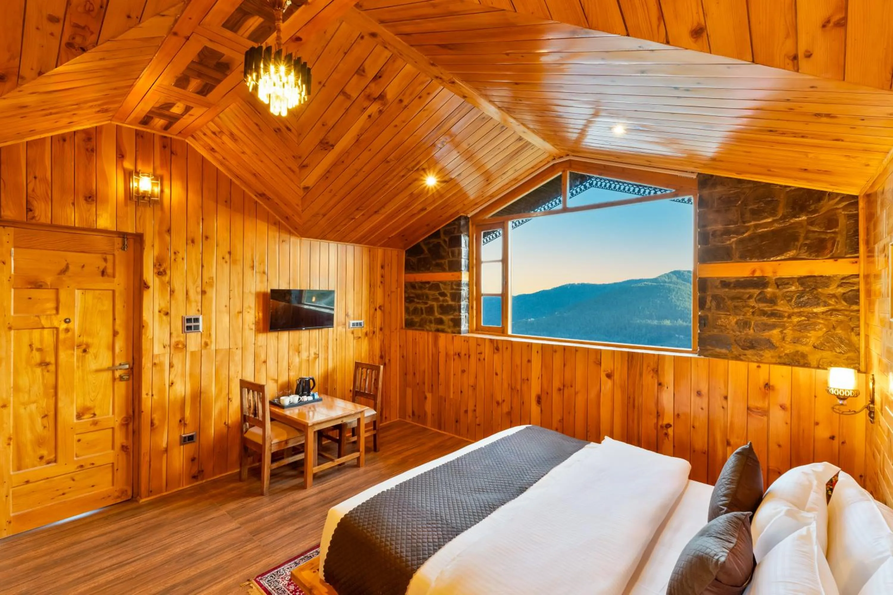 Photo of the whole room, Bed in Kathkuni by Jomotel - A Pure Veg Boutique Stay