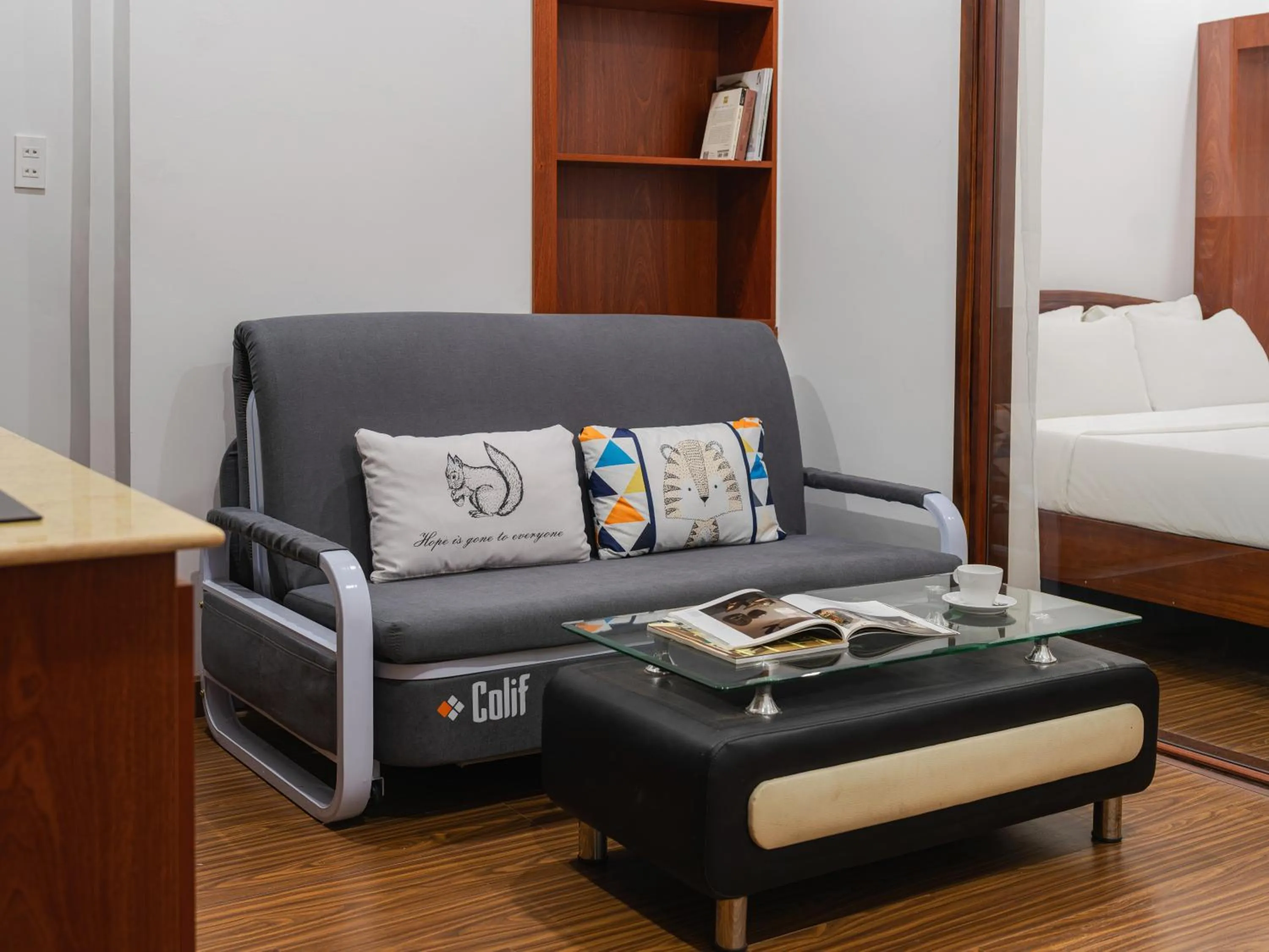 Seating area, Bed in ELC Luxury Da Lat Hotel & Apartment