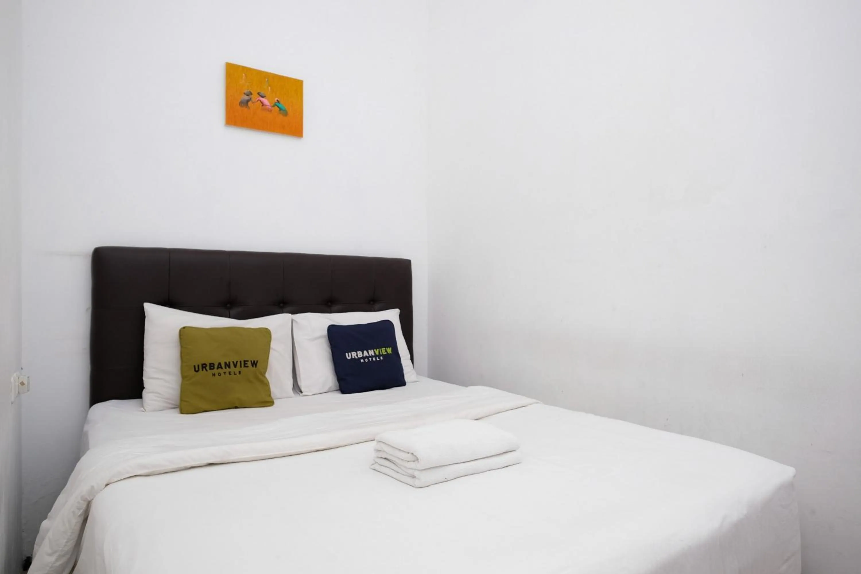 Bedroom, Bed in Urbanview Hotel Dommy Yogyakarta by RedDoorz
