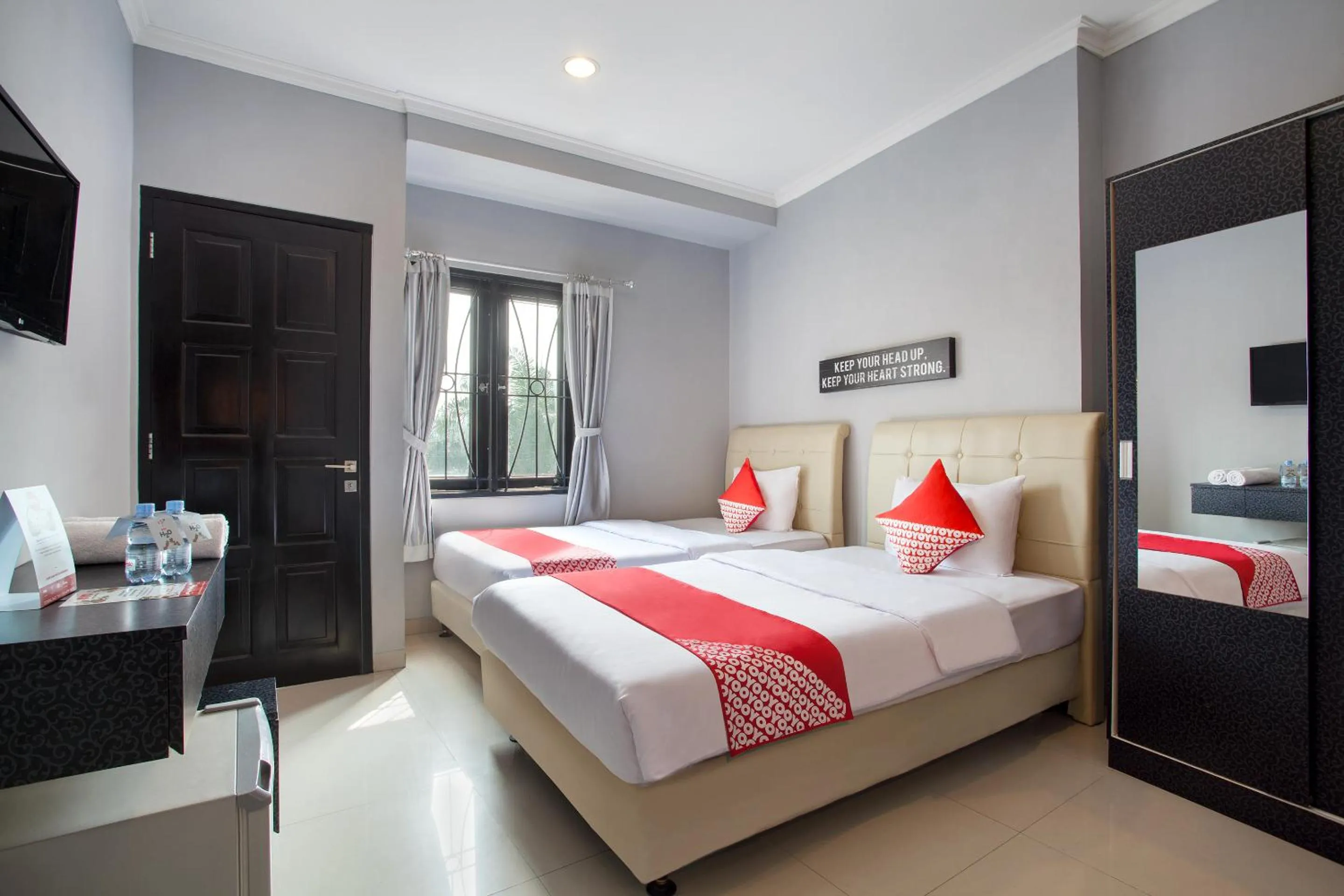 Photo of the whole room, Bed in Collection O Pondok Indah Near Gandaria City Formerly Lamaison Residence