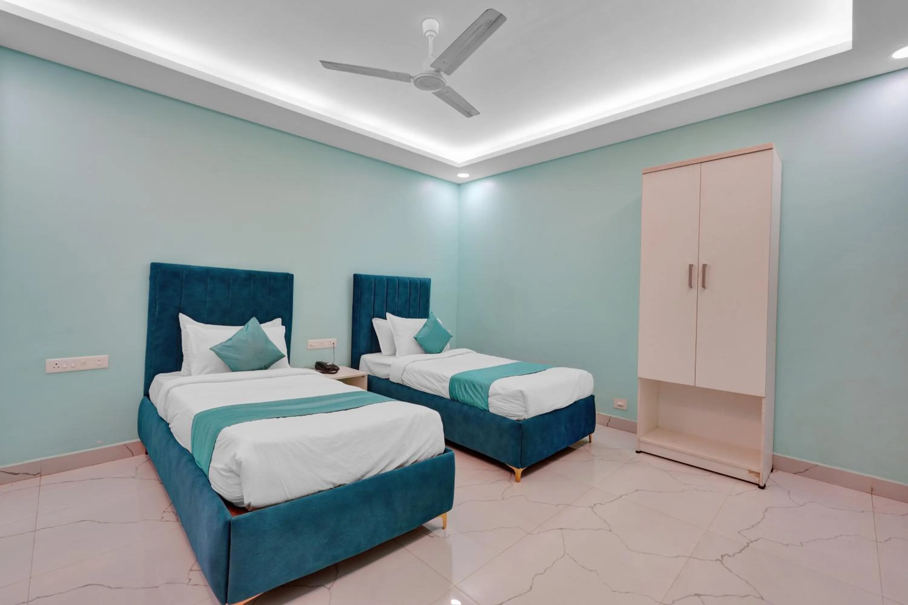 Bed in Rohaan Hotels Medavakkam by UPAR