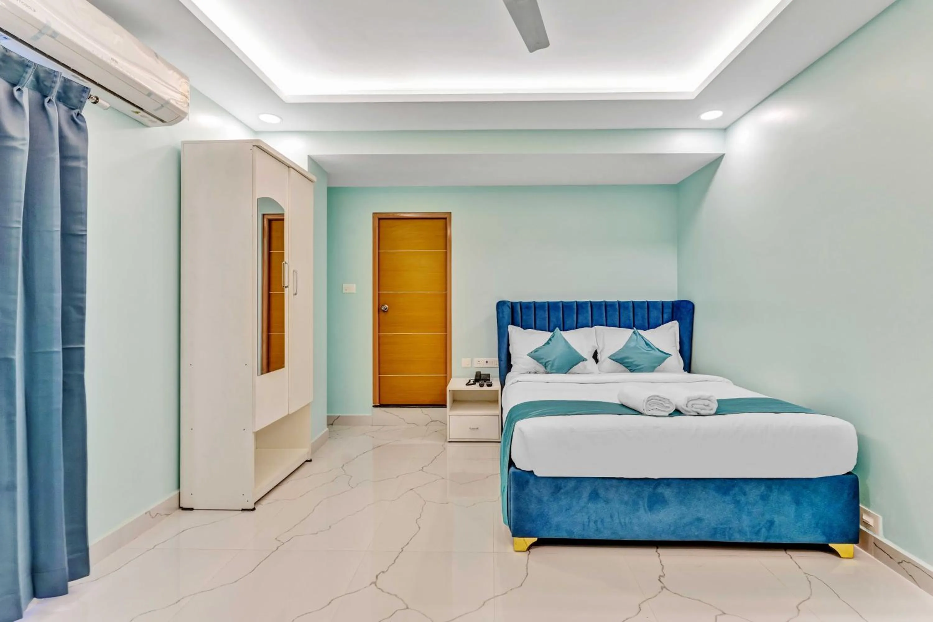 Bed in Rohaan Hotels Medavakkam by UPAR