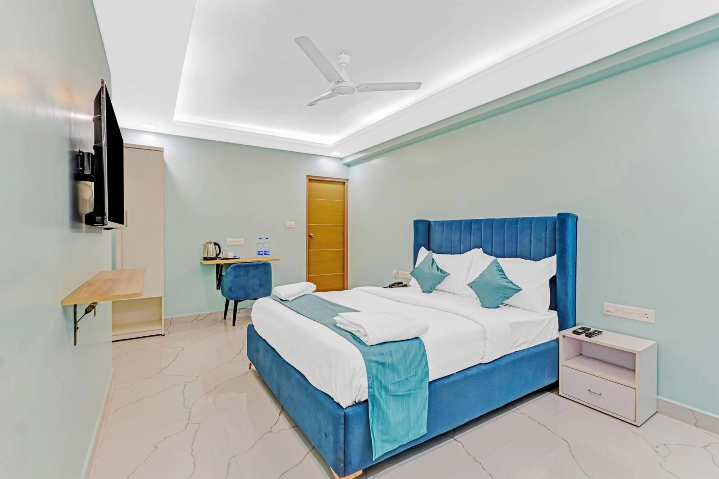 Bed in Rohaan Hotels Medavakkam by UPAR