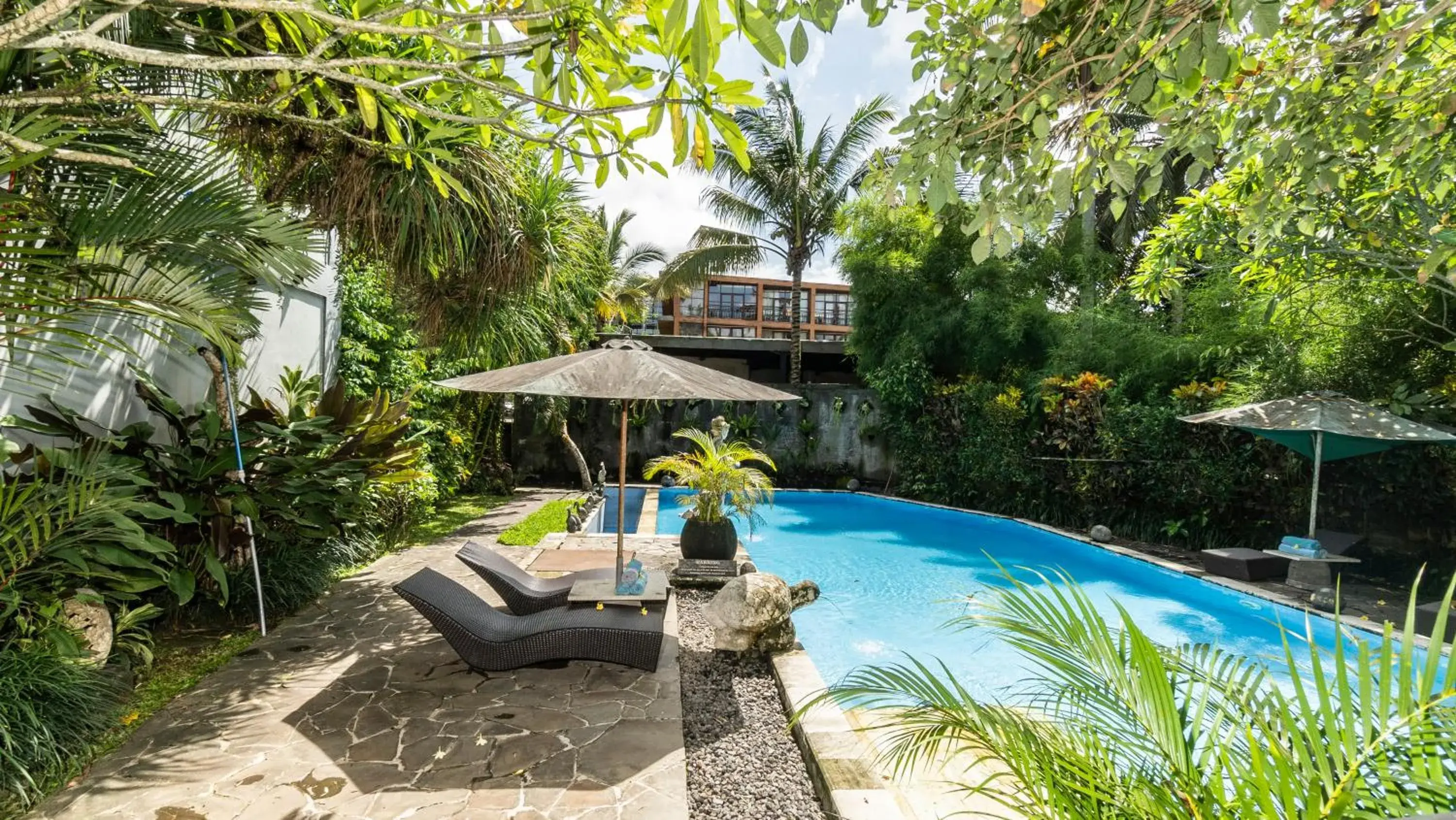 Swimming pool in Gita Maha Ubud Hotel by Mahaputra-CHSE Certified Swimming pool in Gita Maha Ubud Hotel by Mahaputra-CHSE Certified