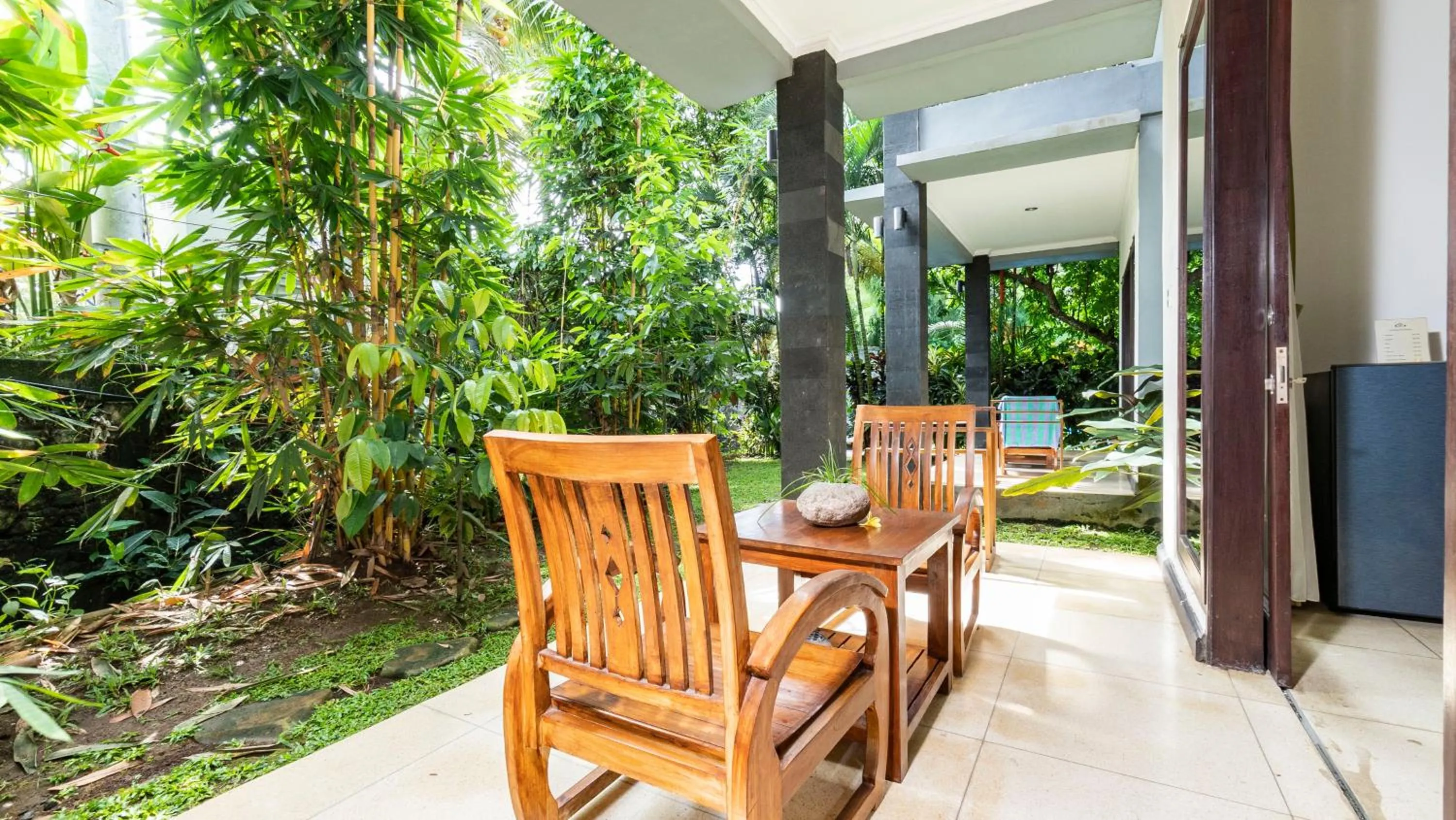 Seating area in Gita Maha Ubud Hotel by Mahaputra-CHSE Certified