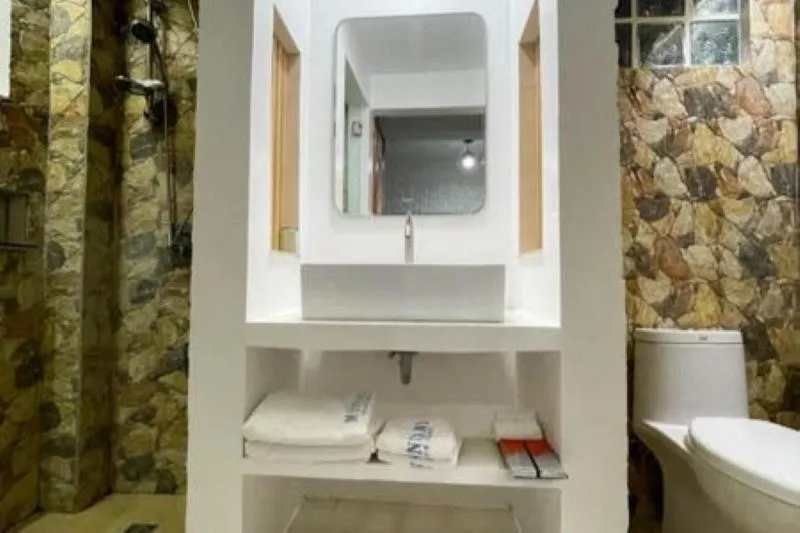 Bathroom in Montani Beach Resort Puerto Galera powered by Cocotel