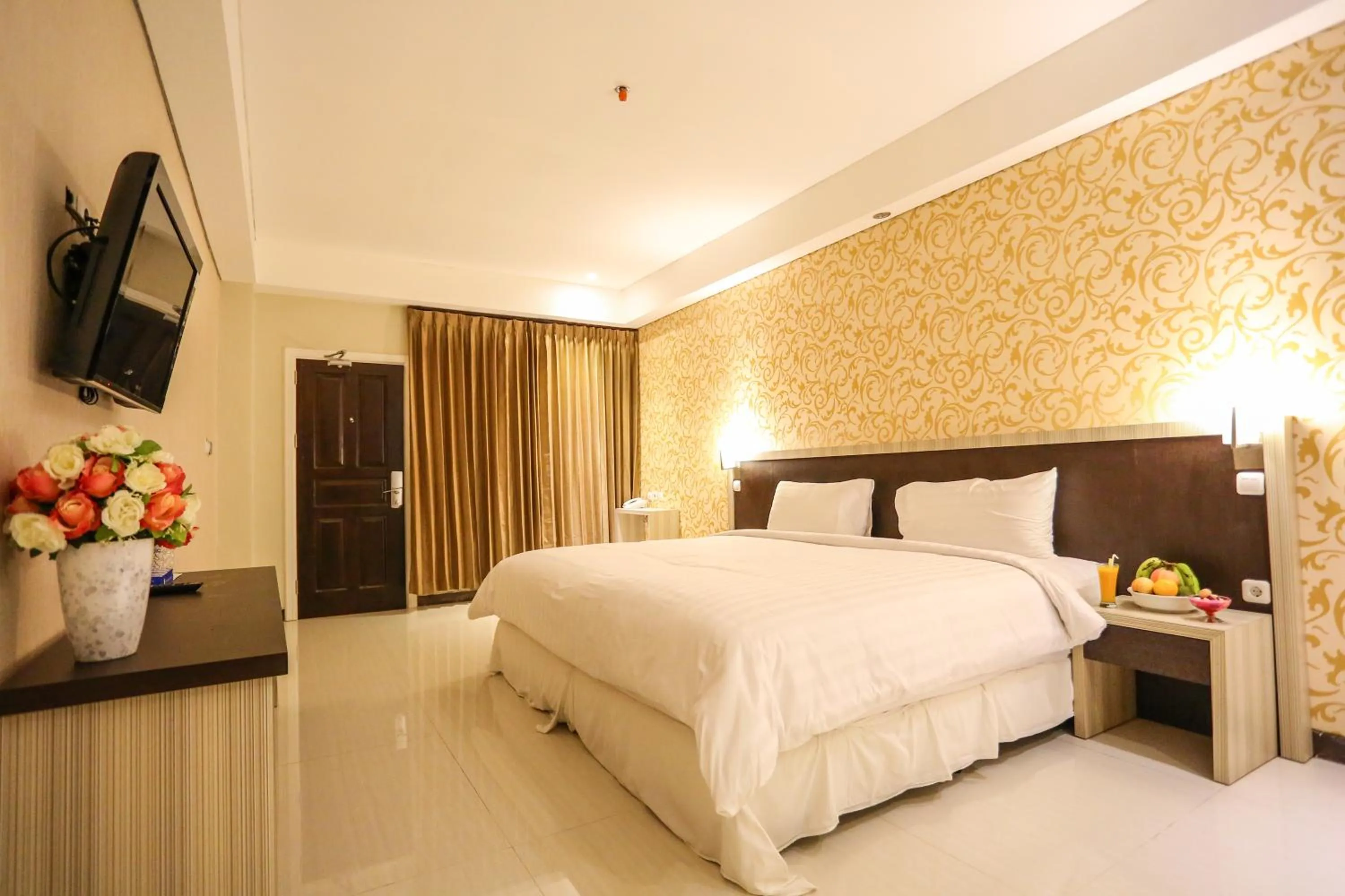 Photo of the whole room, Bed in Sylvia Hotel Premier Kupang