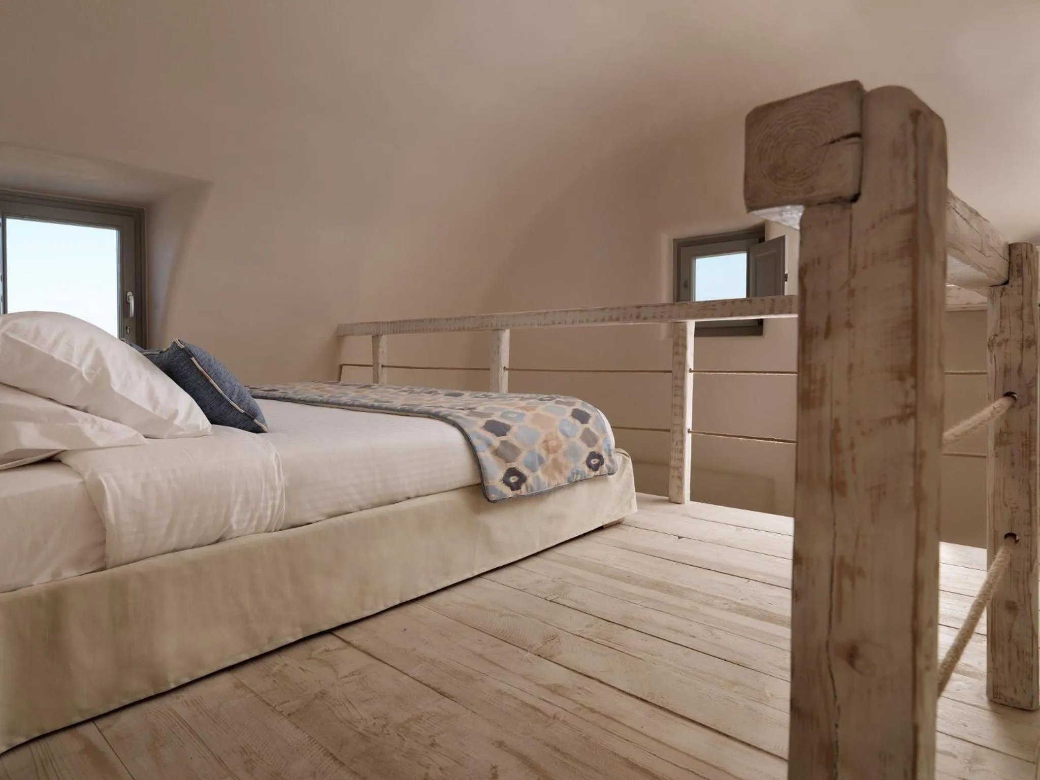 Bed in Dome Santorini Resort