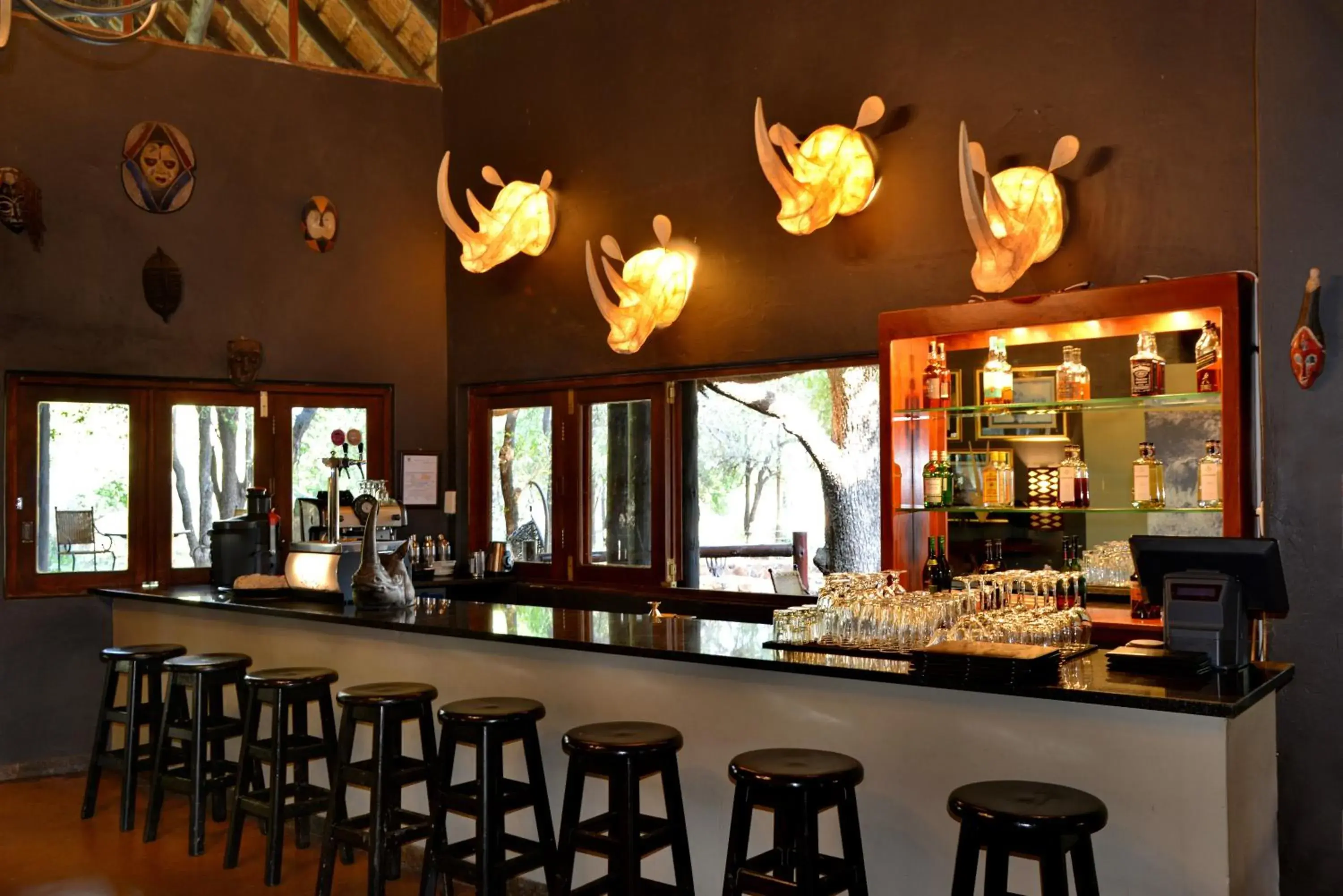 Lounge or bar in Black Rhino Game Lodge Lounge or bar in Black Rhino Game Lodge