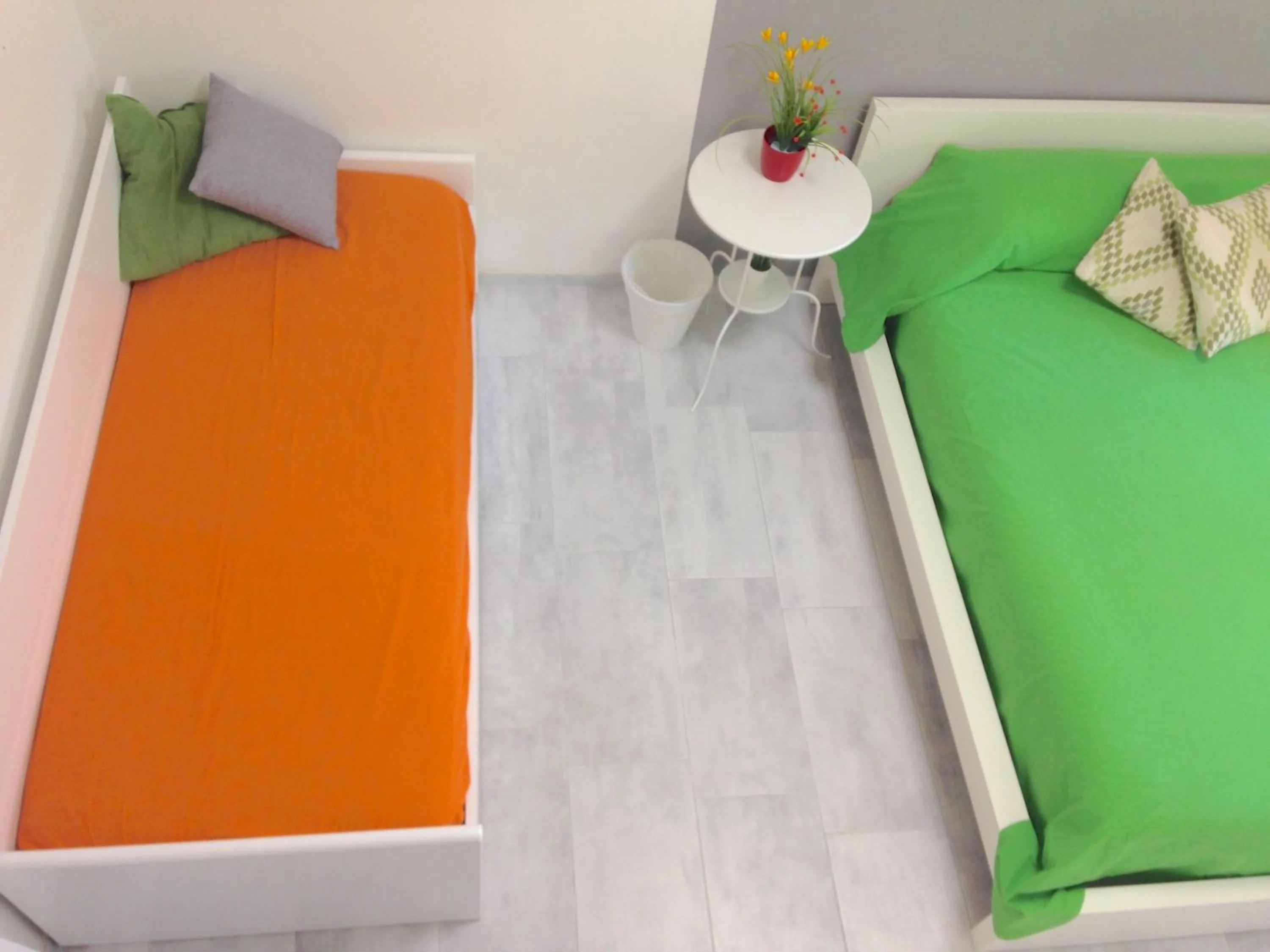 Seating area, Bed in Be Inn