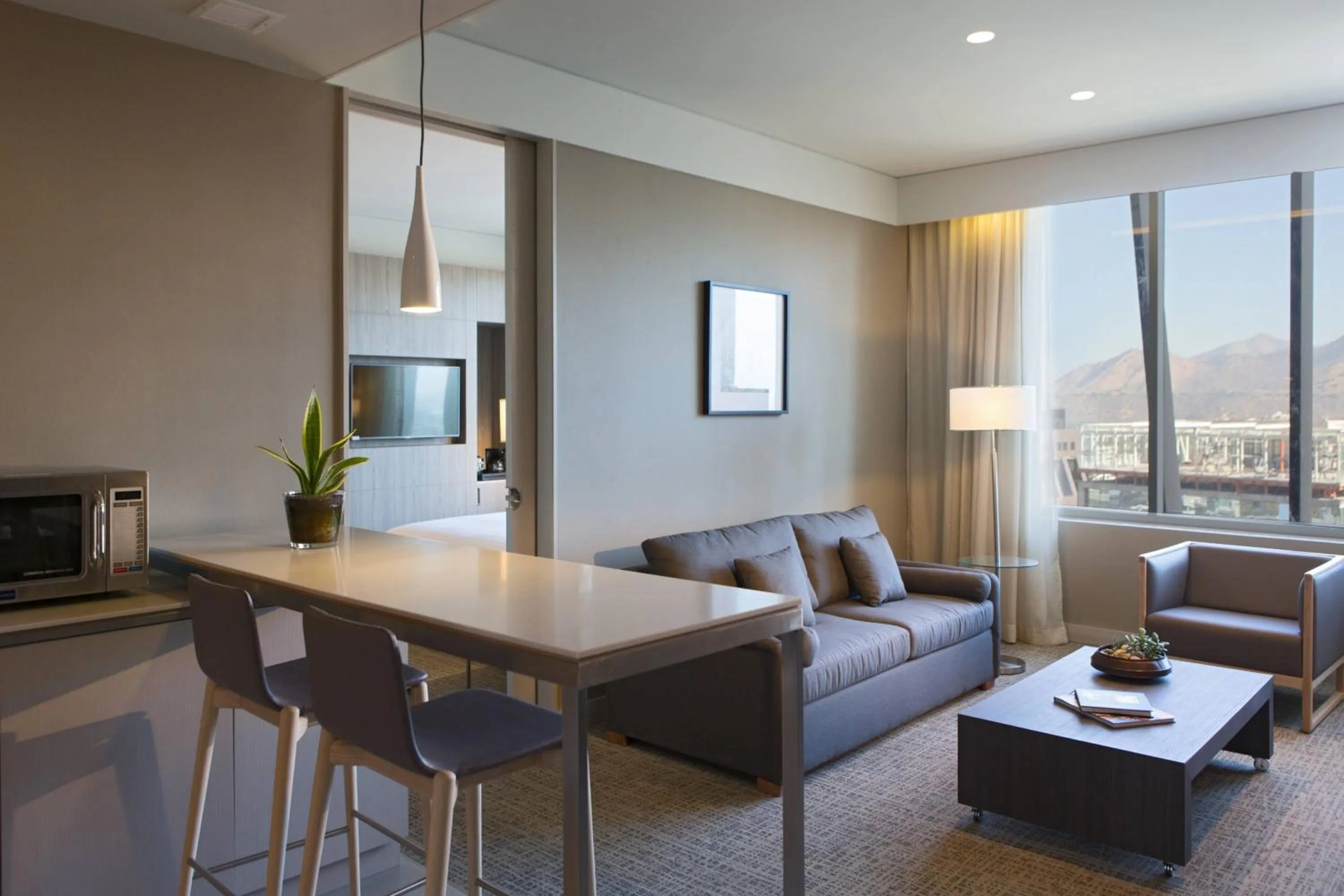 Living room in Courtyard by Marriott Santiago Las Condes